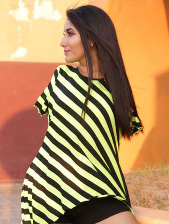 عارضة أزياء بلا ذراعين تتحدى مفاهيم الجمال صورة رقم 17