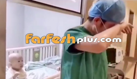 مشهد يدمي القلب.. رضيع صيني مصاب بفيروس كورونا في ووهان! صورة رقم 1