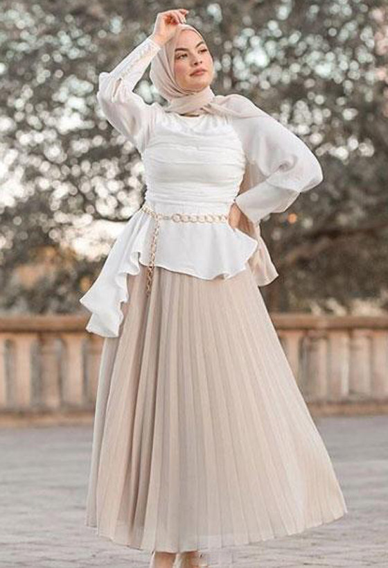 بالصور: إليكم أجمل إطلالات الفاشينيستا المحجبات بالتنورة البليسيه صورة رقم 6 بالصور: إليكم أجمل إطلالات الفاشينيستا المحجبات بالتنورة البليسيه صورة رقم 6