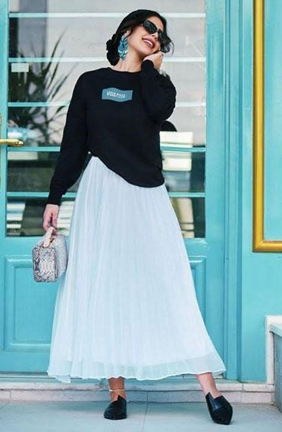 بالصور: إليكم أجمل إطلالات الفاشينيستا المحجبات بالتنورة البليسيه صورة رقم 3 بالصور: إليكم أجمل إطلالات الفاشينيستا المحجبات بالتنورة البليسيه صورة رقم 3