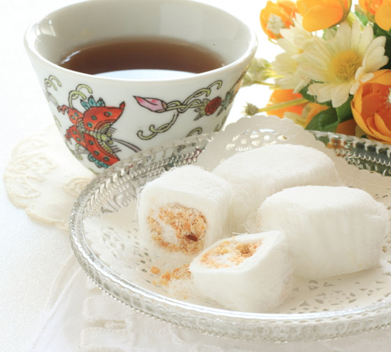 شعر ناعم محشو بالفول السوداني.. إليكم وصفة حلوى خبز التنين الصينية صورة رقم 1 شعر ناعم محشو بالفول السوداني.. إليكم وصفة حلوى خبز التنين الصينية صورة رقم 1