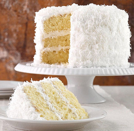 الحلوى المثلى لموسم الأعياد.. وصفة كيك جوز الهند الطري المحشو بالكريمة صورة رقم 5