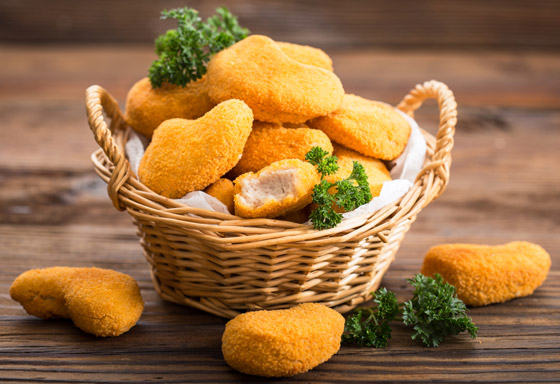 صحية ولذيذة وسريعة.. طريقة تحضير الناغيت في الفرن خلال 20 دقيقة صورة رقم 1 صحية ولذيذة وسريعة.. طريقة تحضير الناغيت في الفرن خلال 20 دقيقة صورة رقم 1