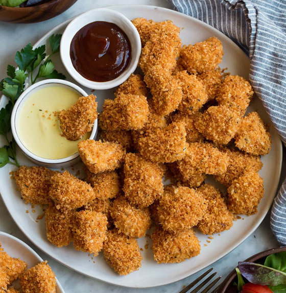 صحية ولذيذة وسريعة.. طريقة تحضير الناغيت في الفرن خلال 20 دقيقة صورة رقم 4 صحية ولذيذة وسريعة.. طريقة تحضير الناغيت في الفرن خلال 20 دقيقة صورة رقم 4