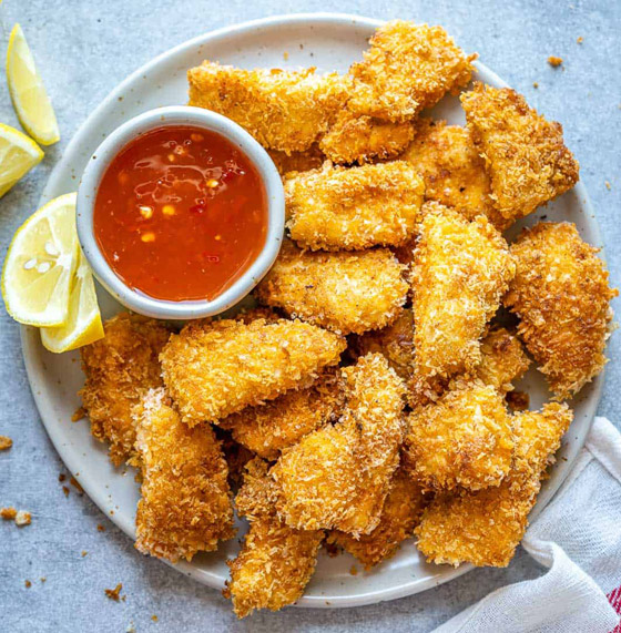 صحية ولذيذة وسريعة.. طريقة تحضير الناغيت في الفرن خلال 20 دقيقة صورة رقم 6 صحية ولذيذة وسريعة.. طريقة تحضير الناغيت في الفرن خلال 20 دقيقة صورة رقم 6