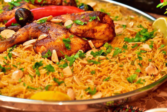 مندي الدجاج الشهير مع صلصة الدقوس الحارة على الطريقة اليمنية صورة رقم 1