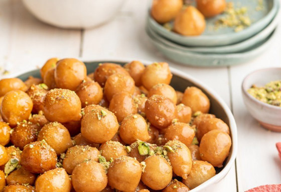 إليكم طريقة تحضير عجينة اللقيمات.. حلوى رمضانية ولا أشهى صورة رقم 2 إليكم طريقة تحضير عجينة اللقيمات.. حلوى رمضانية ولا أشهى صورة رقم 2