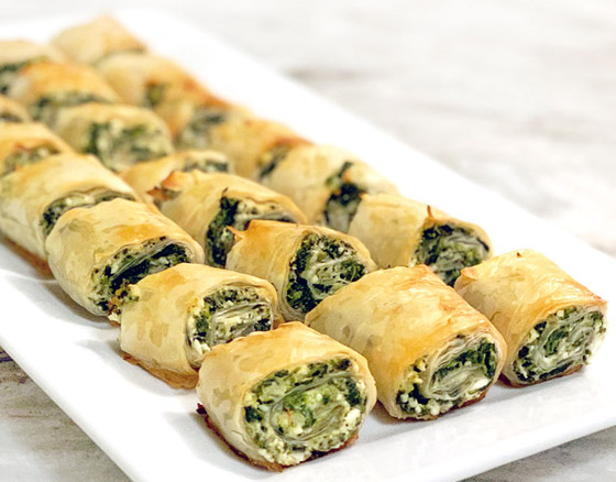 إليكم طريقة تحضير رولات السبانخ والجبن الشهية صورة رقم 5