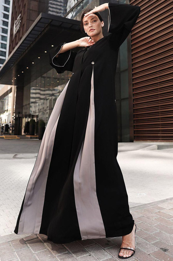 بالصور: إليكم أجمل موديلات عبايات بألوان شتوية موضة 2022 صورة رقم 4 بالصور: إليكم أجمل موديلات عبايات بألوان شتوية موضة 2022 صورة رقم 4