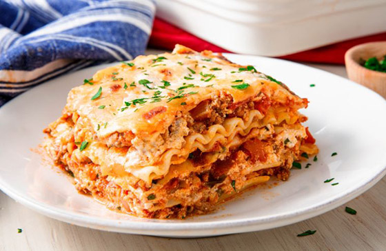 إليكم طريقة تحضير اللازانيا بالنقانق والفطر الأشهى على الإطلاق صورة رقم 7 إليكم طريقة تحضير اللازانيا بالنقانق والفطر الأشهى على الإطلاق صورة رقم 7