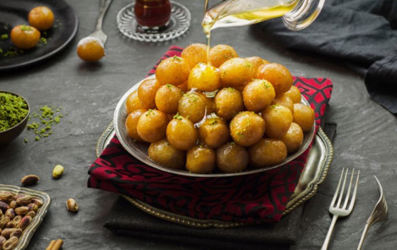 إليكم طريقة تحضير عجينة اللقيمات.. حلوى رمضانية ولا أشهى صورة رقم 1 إليكم طريقة تحضير عجينة اللقيمات.. حلوى رمضانية ولا أشهى صورة رقم 1