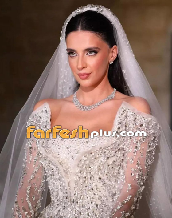 ملكة جمال لبنان بيرلا حلو تخطف الأنظار يوم عرسها.. الفستان بأكمله مطرز بالكريستال صورة رقم 11 ملكة جمال لبنان بيرلا حلو تخطف الأنظار يوم عرسها.. الفستان بأكمله مطرز بالكريستال صورة رقم 11