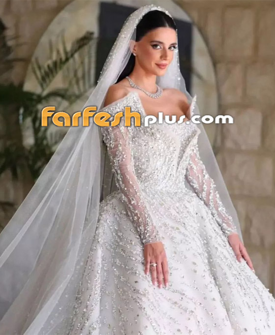 ملكة جمال لبنان بيرلا حلو تخطف الأنظار يوم عرسها.. الفستان بأكمله مطرز بالكريستال صورة رقم 12 ملكة جمال لبنان بيرلا حلو تخطف الأنظار يوم عرسها.. الفستان بأكمله مطرز بالكريستال صورة رقم 12