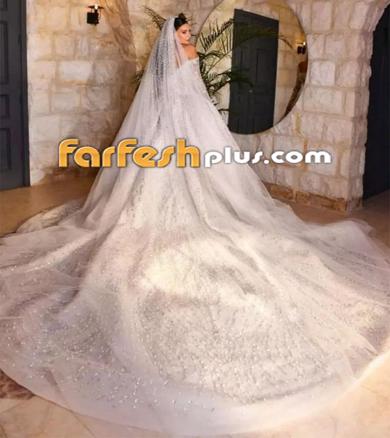 ملكة جمال لبنان بيرلا حلو تخطف الأنظار يوم عرسها.. الفستان بأكمله مطرز بالكريستال صورة رقم 14 ملكة جمال لبنان بيرلا حلو تخطف الأنظار يوم عرسها.. الفستان بأكمله مطرز بالكريستال صورة رقم 14
