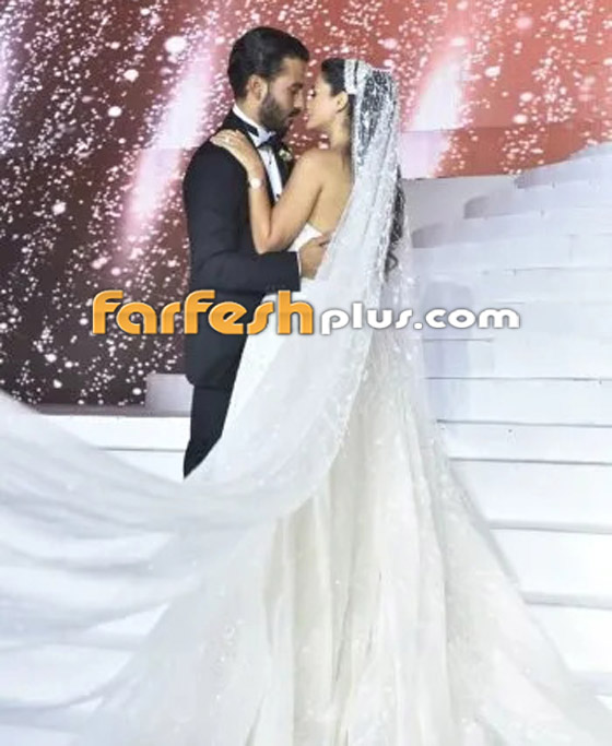 ملكة جمال لبنان بيرلا حلو تخطف الأنظار يوم عرسها.. الفستان بأكمله مطرز بالكريستال صورة رقم 6 ملكة جمال لبنان بيرلا حلو تخطف الأنظار يوم عرسها.. الفستان بأكمله مطرز بالكريستال صورة رقم 6