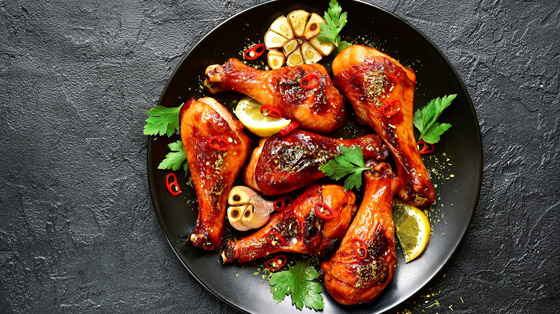 اليك طريقة تحضير أفخاذ الدجاج اللذيذة مع الثوم والعسل صورة رقم 1