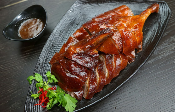 أوزة محمصة وديم سوم.. أشهر 10 أطباق شهية تعكس غنى المطبخ الصيني صورة رقم 1 أوزة محمصة وديم سوم.. أشهر 10 أطباق شهية تعكس غنى المطبخ الصيني صورة رقم 1