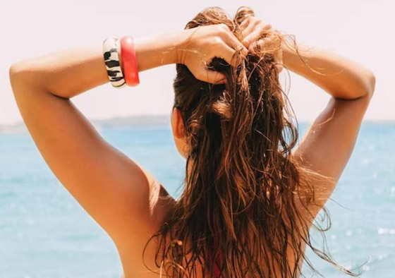 حماية الشعر من الشمس والبحر.. طرق فعالة تحافظ على صحته وحيويته صورة رقم 1