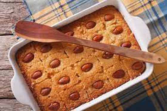 طريقة عمل.. صينية البسبوسة باللوز والسكر صورة رقم 4