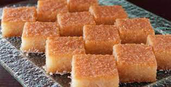 طريقة عمل.. صينية البسبوسة باللوز والسكر صورة رقم 7