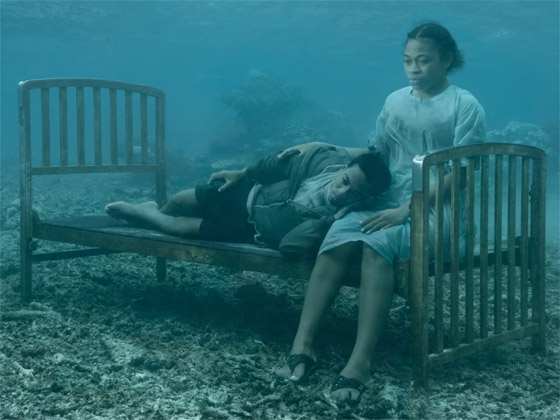 صورة رقم 6 - تحبس الأنفاس.. صور مؤرقة لأشخاص تحت الماء تُجسد عواقب تغير المناخ صورة رقم 6 - تحبس الأنفاس.. صور مؤرقة لأشخاص تحت الماء تُجسد عواقب تغير المناخ