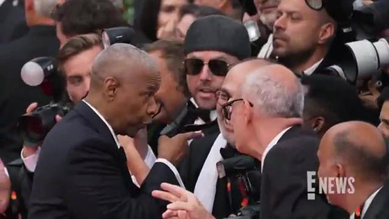صورة رقم 1 - النجم دينزل واشنطن ينفعل ويوب خ مصورا استفزه على السجادة الحمراء بمهرجان كان السينمائي صورة رقم 1 - النجم دينزل واشنطن ينفعل ويوب خ مصورا استفزه على السجادة الحمراء بمهرجان كان السينمائي