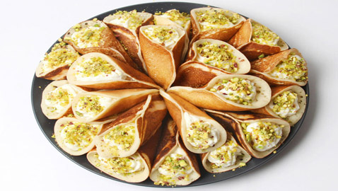 إليكم طريقة تحضير قطايف عصافيري بالقشطة الشهية والمميزة